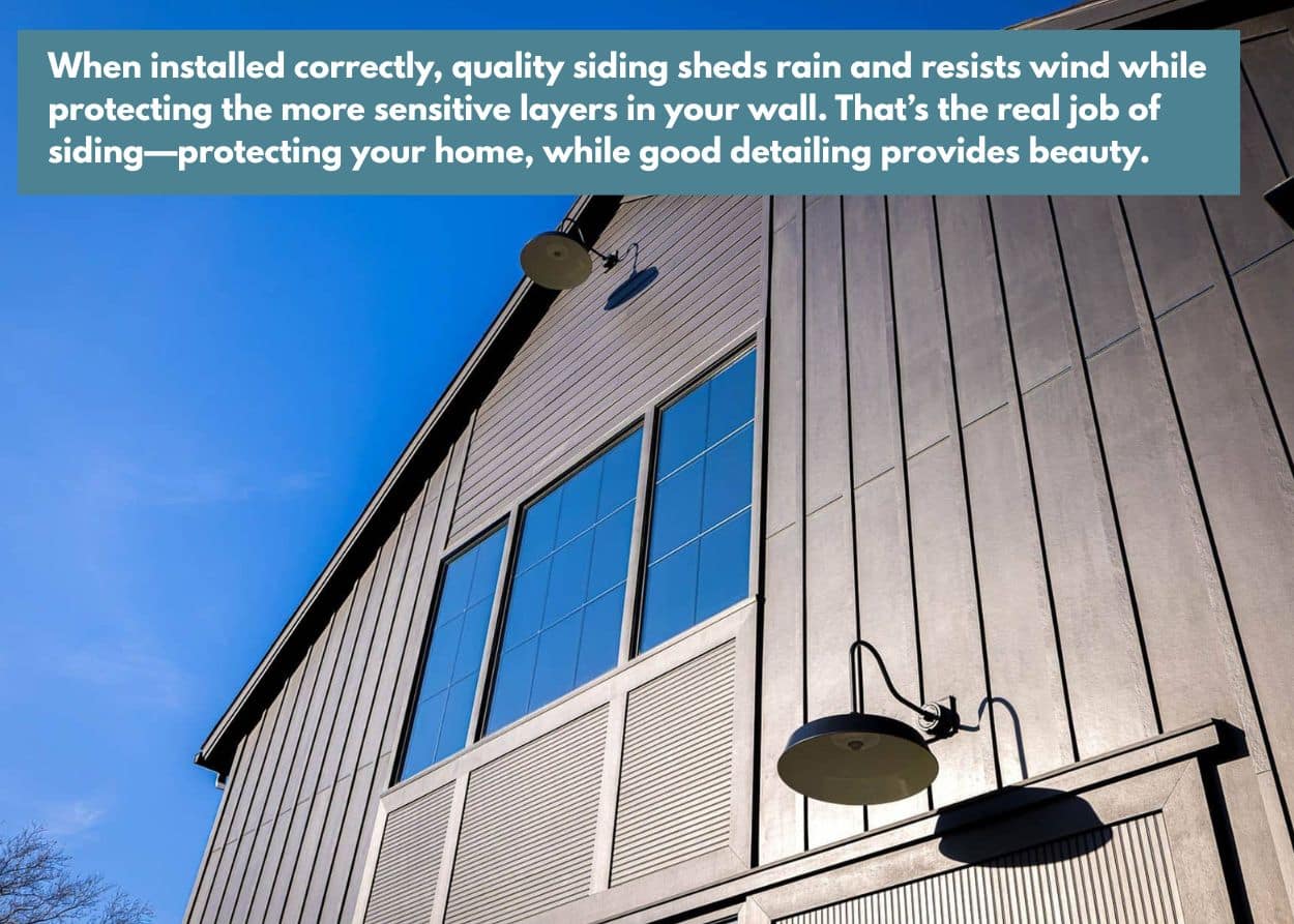 Modern black board and batten siding on a tall gabled home with large grid-style windows under a bright blue sky. Caption: When installed correctly, quality siding sheds rain and resists wind while protecting the more sensitive layers in your wall. That’s the real job of siding—protecting your home, while good detailing provides beauty.
