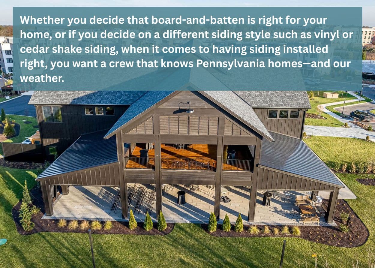 Large residential building with board-and-batten siding and covered outdoor living space.