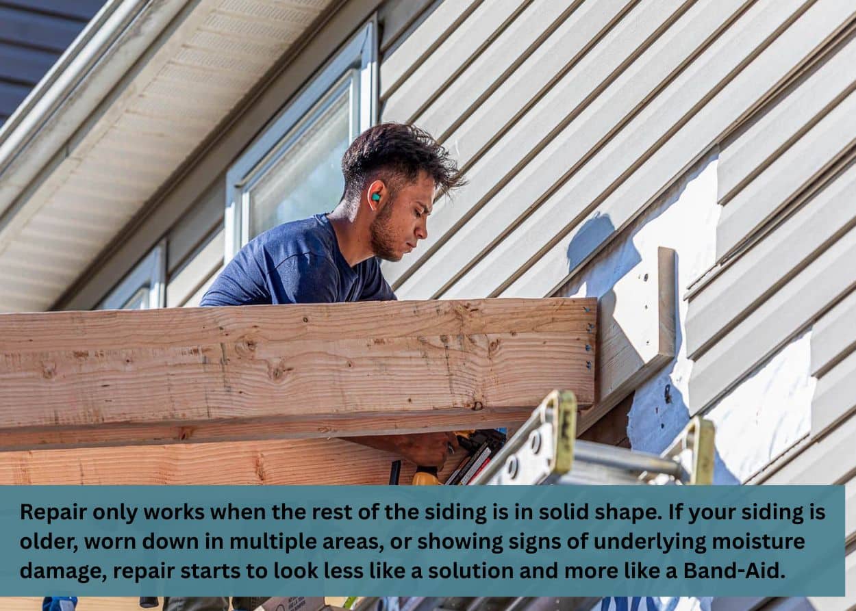Contractor repairing damaged house siding, showing when siding repair is a practical solution.