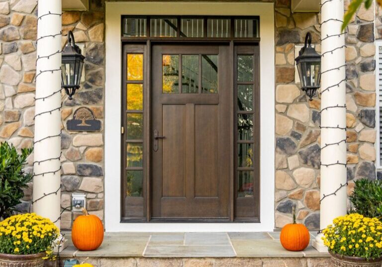 Trim and replacement front and basement doors in a Chester Springs house