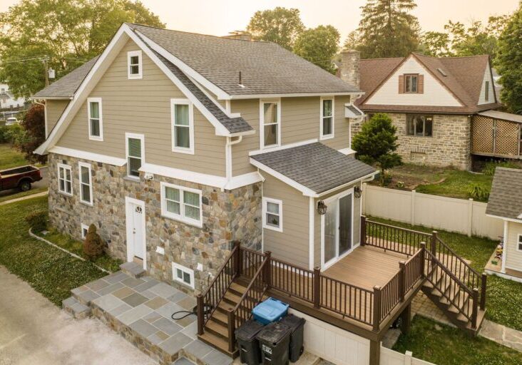Professional installation of James Hardie fiber cement siding and a stone veneer base for a residential home in Drexel Hill, PA.